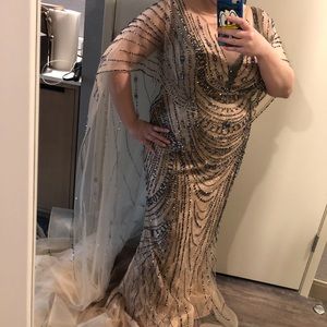 Beautiful gown with long cape